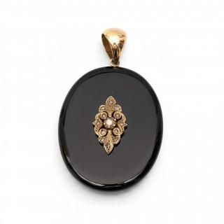 An onyx and diamond pendant – kavel bij Veilinggebouw De Zwaan, Amsterdam