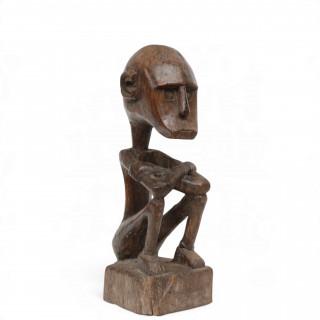 Indonesië, gehurkt houten sculptuur – kavel bij Veilinggebouw De Zwaan, Amsterdam